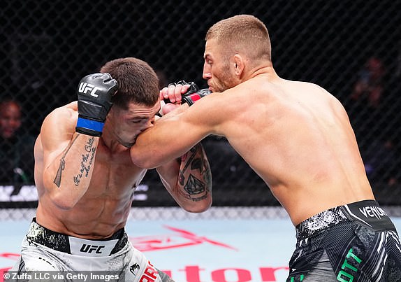 MANCHESTER, ENGLAND - JULY 27: (R-L) Oban Elliott of England lands an elbow on Preston Parsons during a welterweight bout at UFC 304 event at Co-op Live on July 27, 2024 in Manchester, England.  (Photo by Chris Unger/Zuffa LLC via Getty Images)