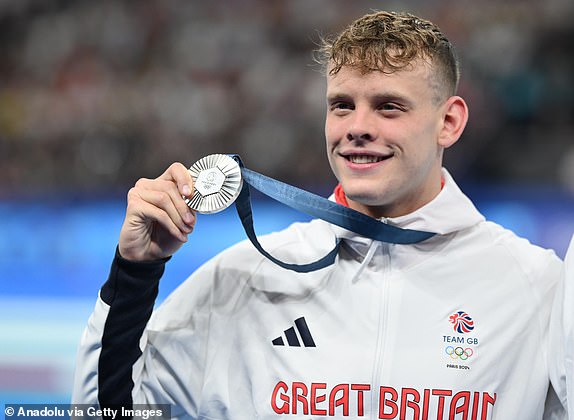 PARIS, FRANCE - JULY 29: Silver Medalist Matthew Richards of Team Great Britain poses with his medal after the Men's 200m Freestyle Final during the Paris 2024 Olympic Games at the Paris La Defense Arena in Nanterre, France on July 29, 2024. (Photo by Mustafa Yalcin/Anadolu via Getty Images)