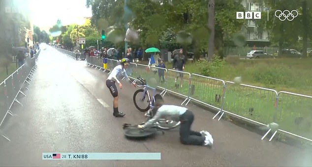 American rider Taylor Knibb (pictured) fell off her bike during the race, with her mechanic also falling on the slippery surface
