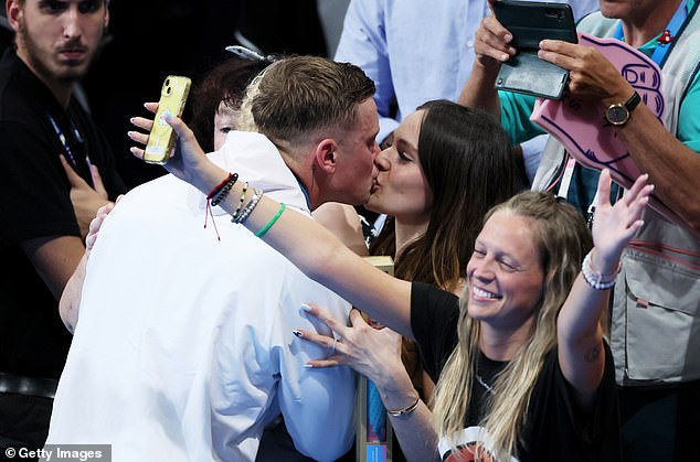 Peaty kissing his girlfriend Holly Ramsey, daughter of famous TV chef Gordon Ramsey