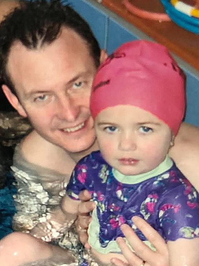 Ariarne Titmus is pictured with her dad Steve during her first swimming lesson in Tasmania