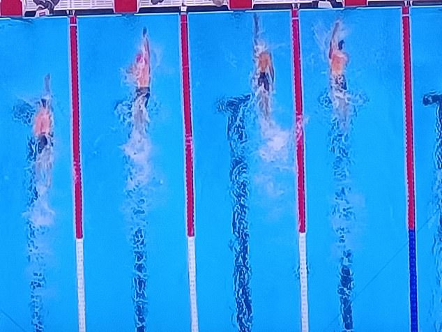 A freeze frame of the finish line shows Hobson (right) was just a few inches shy of winner David Popovici (second from right) when the Romanian completed the race
