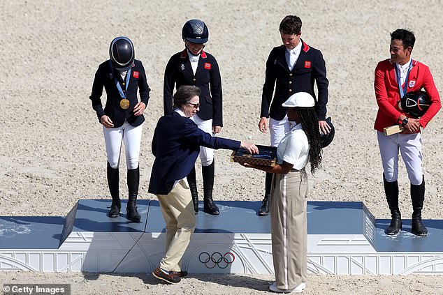 Princess Anne, who participated in eventing at the 1976 Montreal Games, presented medals to the equestrian team at Chateau de Versailles