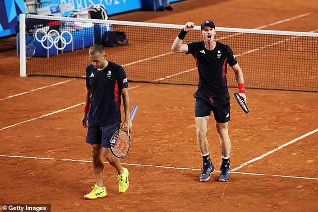 Murray pumps his fist during a thrilling doubles' encounter at Roland Garros on Tuesday night
