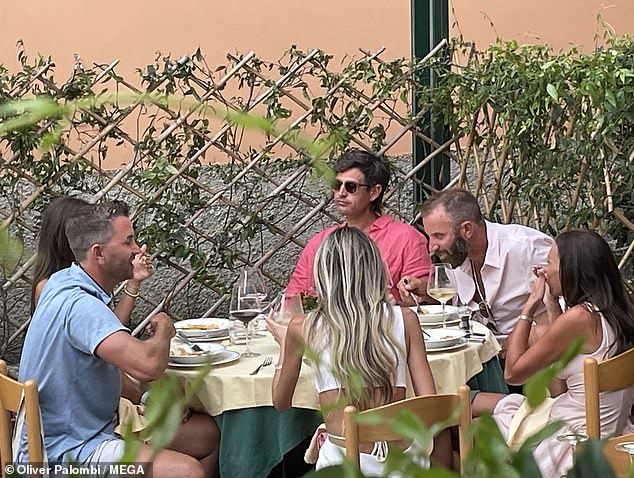 Johnson is seen out at dinner with his brother Austin and their wives in Portofino