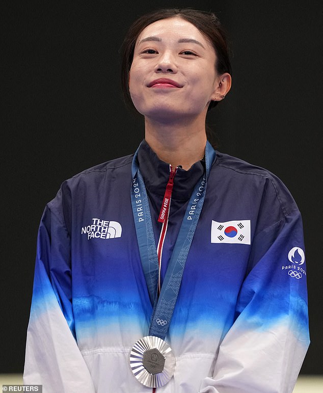 Kim celebrating her first Olympic medal
