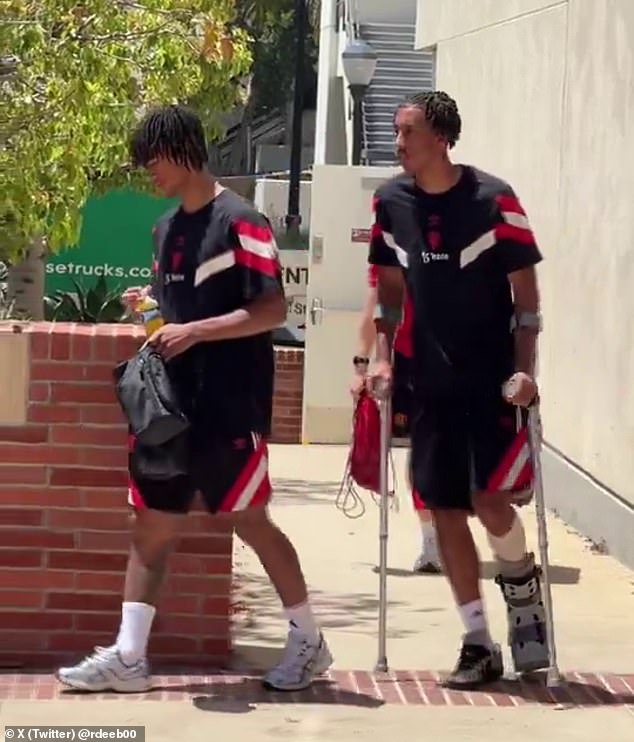 Leny Yoro was spotted on crutches with his left foot in a protective boot at the club's base