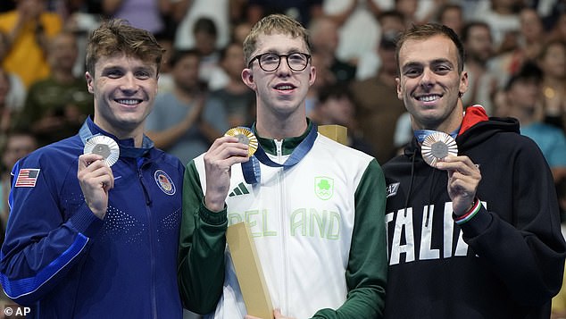 Daniel Wiffen of Ireland (centre) pipped Bob Finke (left) and Gregorio Paltrinieri (right) to gold