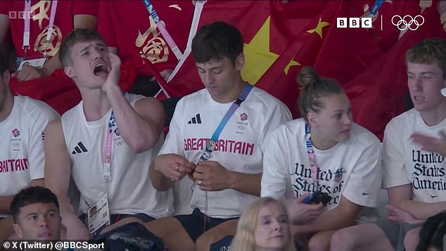 Tom Daley was spotted knitting in the stands as he watched the women's synchronized 10m platform event in Paris on Wednesday