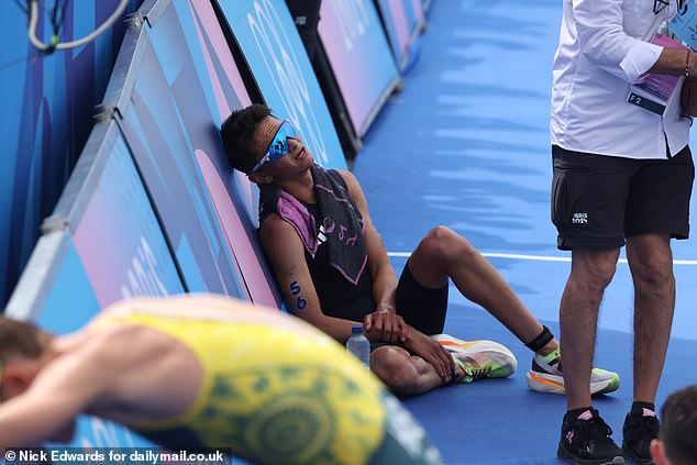 An exhausted Yee is seen at the finish line after surging past Wilde in dramatic fashion