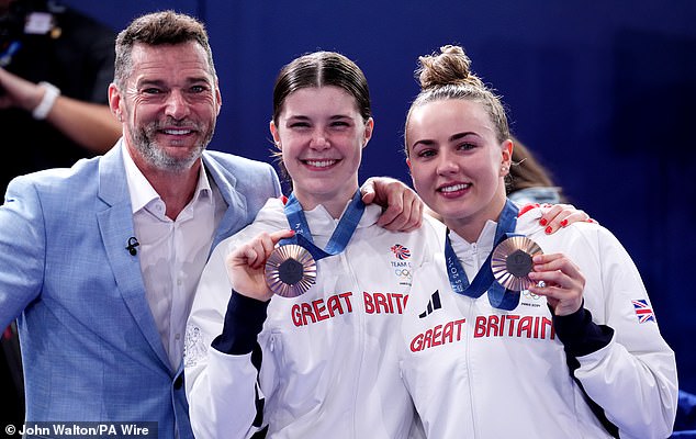 Fred Sirieix with his daughter Andrea Spendolini-Sirieix and her diving partner Lois Toulson following their Bronze-medal win
