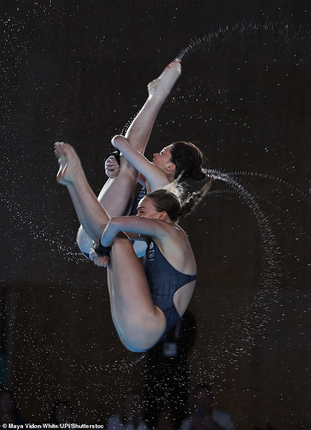 The pair, pictured here in the tuck position during a dive, took third place in the close competition