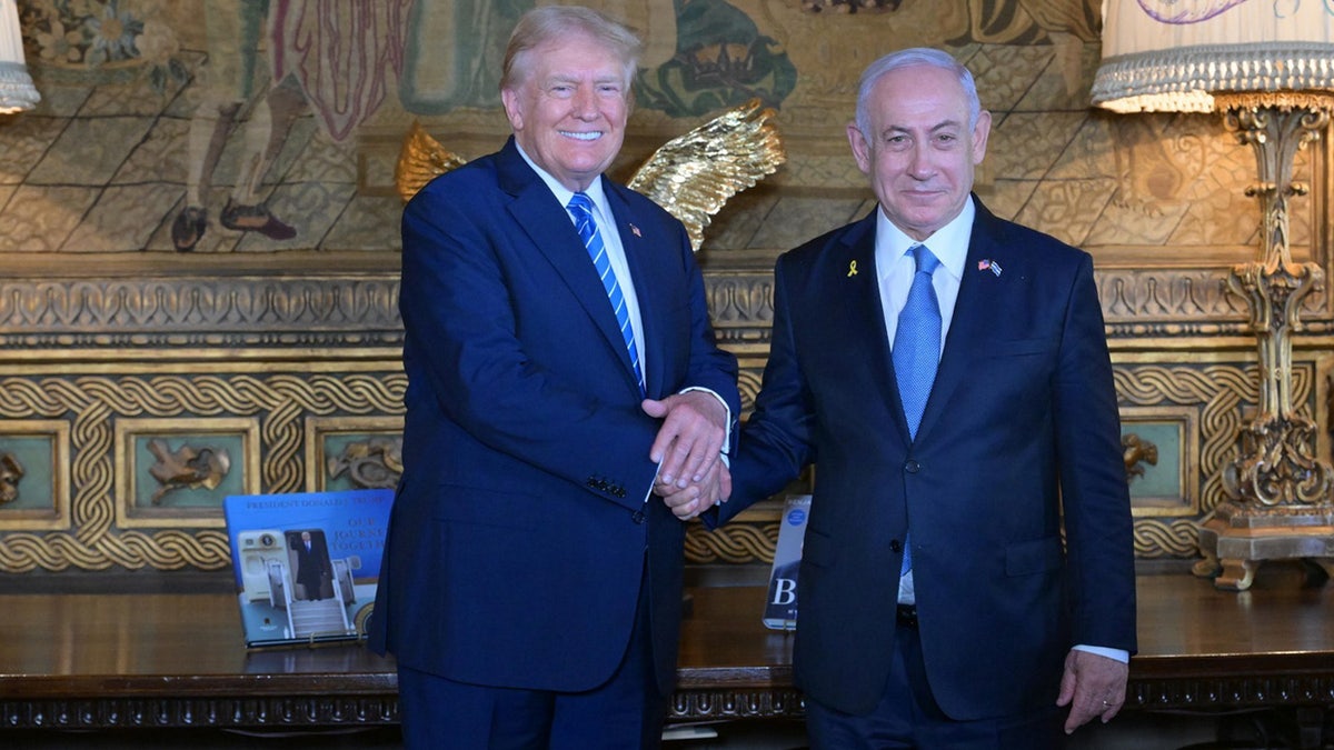 Donald Trump greets Israeli Prime Minister Benjamin Netanyahu
