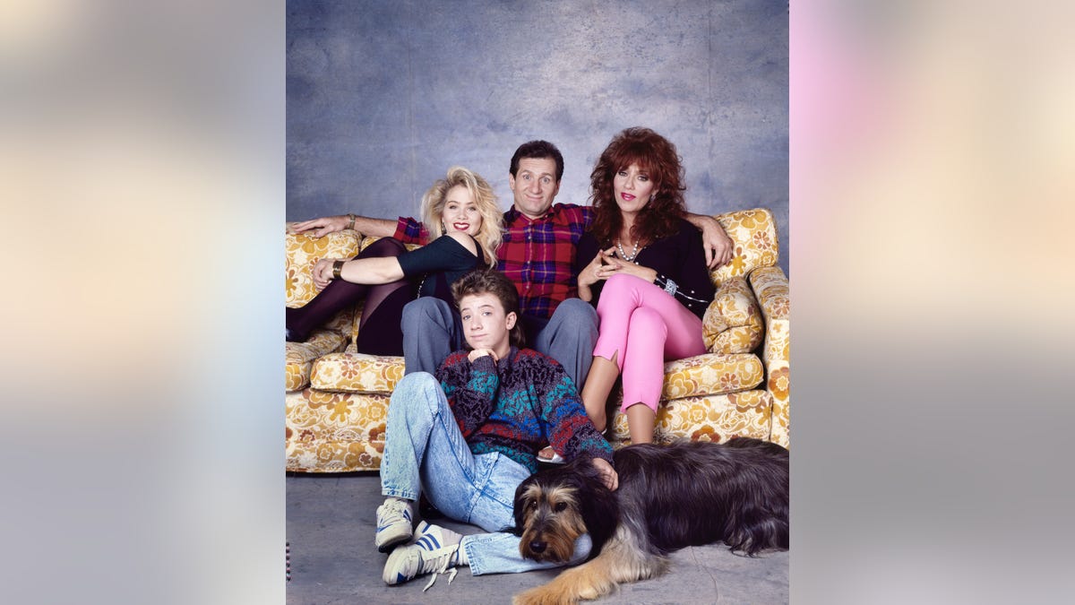 "Married… with Children" cast members Christina Applegate, David Faustino, Ed O'Neill, and Katy Sagal pose together in October 1988.