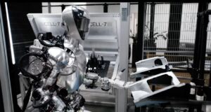 Humanoid robot gets to work in BMW assembly plant