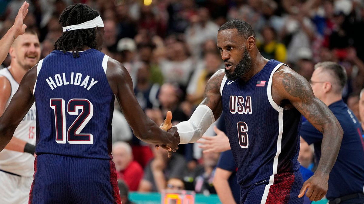 LeBron James and Jrue Holiday