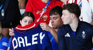 Tom Daley spotted KNITTING as he watches fellow divers at Paris Olympics – just two days before he goes for Olympic gold