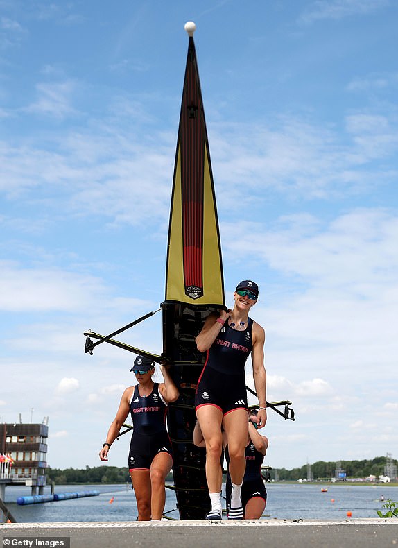PARIS, FRANCE - JULY 25: Heidi Long of Team Great Britain lifts the Women's Right boat out of the water ahead of the Rowing at Vaires-Sur-Marne Nautical Stadium on July 25, 2024 in Paris, France. (Photo by Alex Davidson/Getty Images)