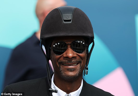 VERSAILLES, FRANCE - AUGUST 03: Snoop Dogg attends the Dressage Team Grand Prix Special on day eight of the Olympic Games Paris 2024 at Chateau de Versailles on August 03, 2024 in Versailles, France. (Photo by Mike Hewitt/Getty Images)
