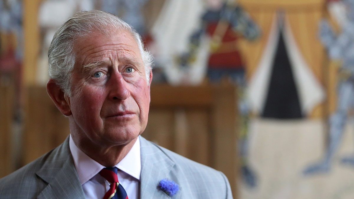A solemn-looking King Charles.
