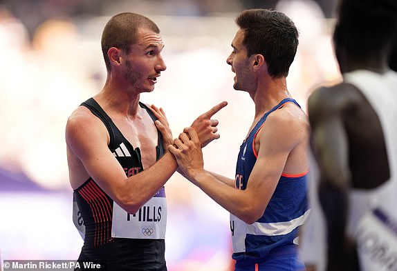 Great Britain's George Mills and France's Hugo Hay in action during the Men's 5000m heats at the Stade de France on the twelfth day of the 2024 Paris Olympic Games in France.