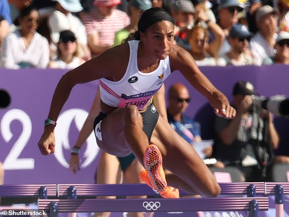 Mandatory Credit: Photo by Shutterstock (14626633a) Belgian athlete Nafissatou Thiam pictured during the warm-up for the 100m hurdles race at the women's heptathlon competition during the 2024 Paris Olympic Games, on Thursday 08 August 2024 in Paris, France.