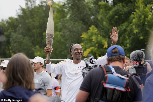 Snoop Dogg was one of the individuals who carried the torch across Paris before the games