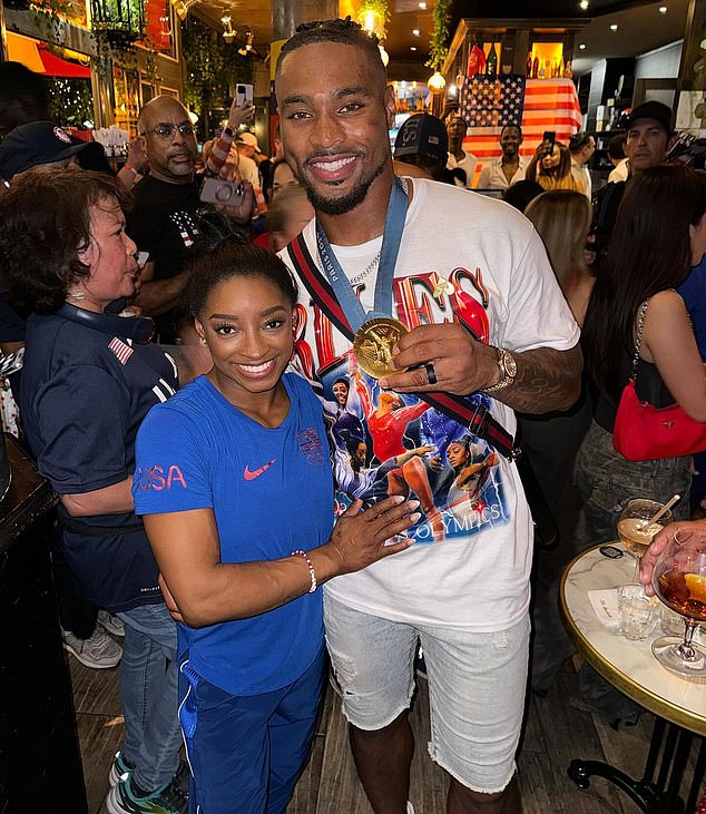 Simone Biles has fired back at Jonathan Owens' critics after the USA gymnast's husband was slammed by fans for wearing her Olympic gold medal