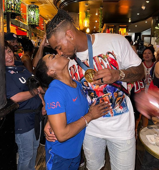 Owens, who is out in Paris to watch Biles in action, celebrated his wife while wearing her medal in a heartwarming post on Instagram