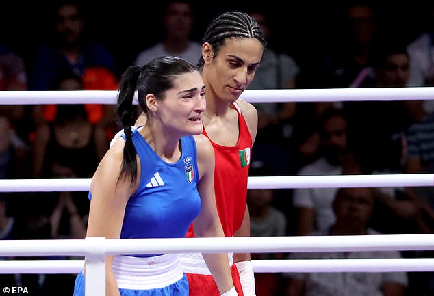 Female Italian boxer Angela Carini (in blue) claims she stopped her Olympic contest to 'save my life'.
