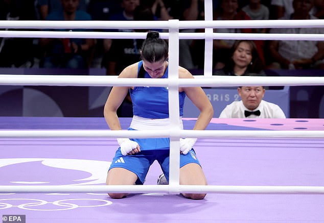With her Olympic dreams shattered after just 46 seconds, the heartbroken Italian fighter Carini collapsed and wept.