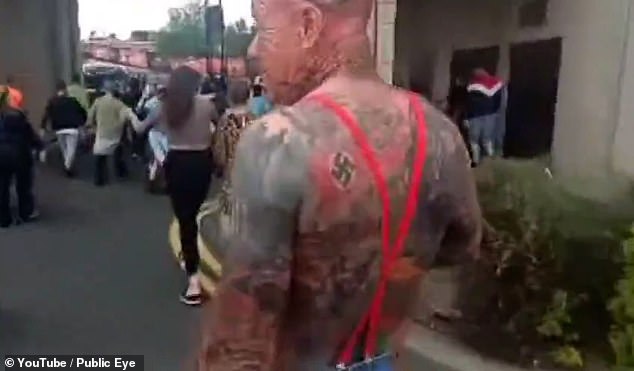 A man in Sunderland was observed wearing red braces and a Swastika tattoo on his back