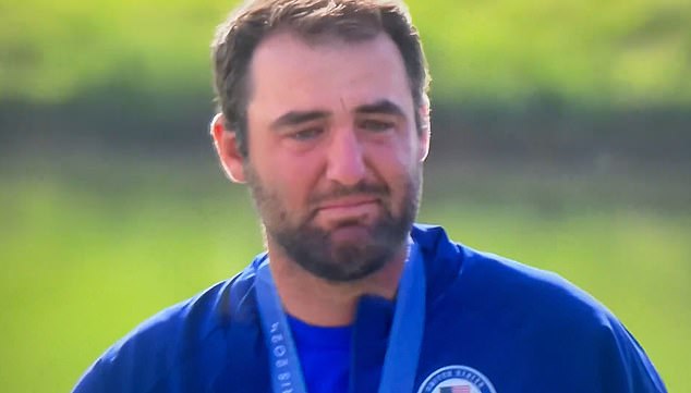 An emotional Scottie Scheffler burst into tears after capturing an Olympic gold medal in Paris