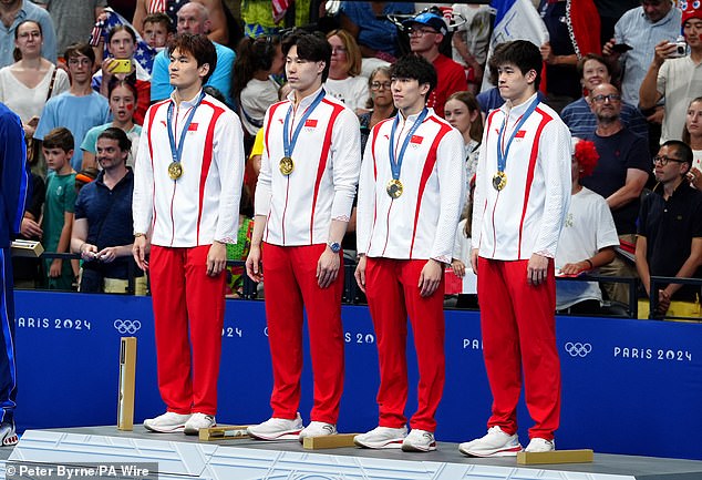China clinched gold following a world-record freestyle leg from Pan Zhanle