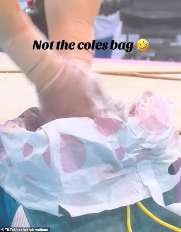 Moore was seen using a Coles plastic bag to carry his chalk, essential for maintaining grip during his routine