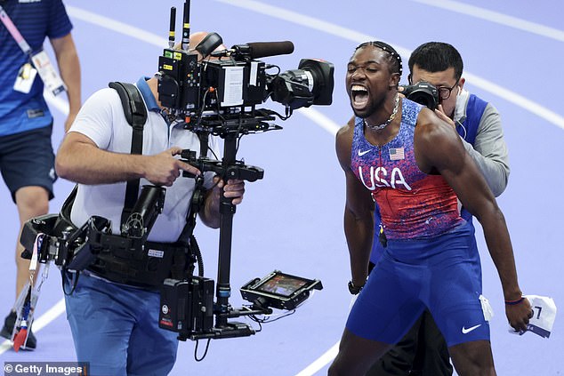 Lyles celebrated wildly after being forced to nervously wait for the results during a photo finish