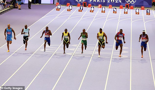 Lyles (second from right) was one of the slowest out of the blocks before recovering superbly