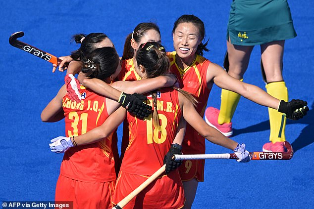 China came from 1-0 down to cause a 3-2 upset against the Hockeyroos