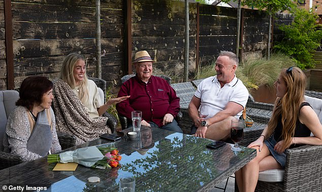 Keely Hodgkinson alongside grandmother Carol Hodgkinson, grandfath Joe Hodgkinson, father Dean Hodgkinson and sister Tilly Hodgkinson during a family gathering on May 6, 2024 in Atherton, England