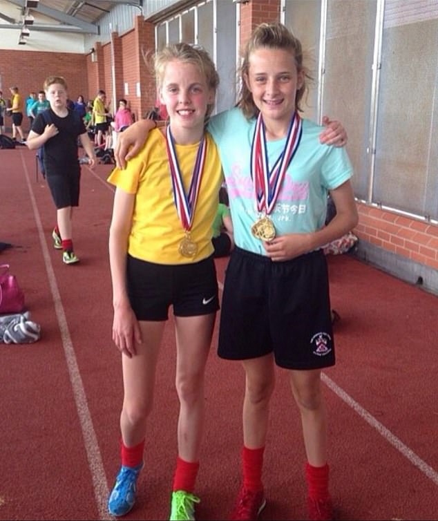Keely Hodgkinson is pictured with her former school-mate England footballer Ella Toone