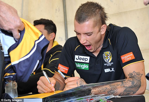 Martin is pictured signing autographs in 2014. Ten years later, he's at a loose end after closing the door on his stellar playing career