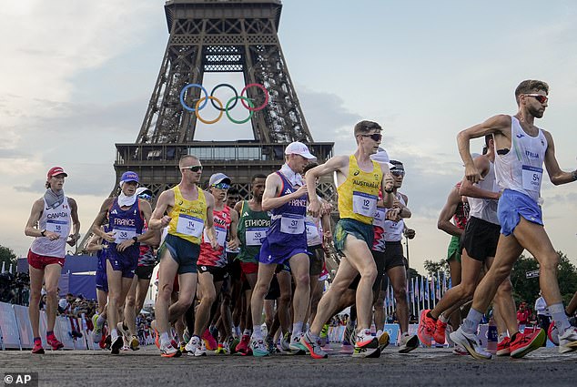 Australians Declan Tingay and Rhydian Cowley (in yellow) are pictured competing in the men's race walk in Paris, which inspired Alcott to make jokes with his followers