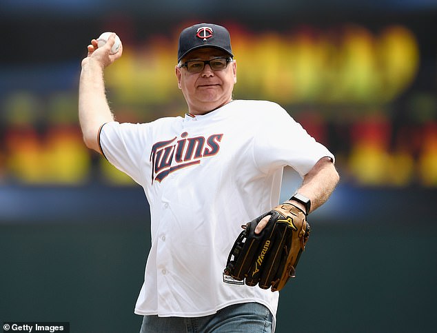 Walz is an avid sports fan, as seen here throwing out the first pitch at a Twins game in 2019