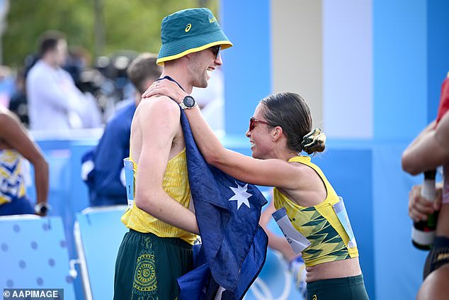 Rhydian Cowley and Jemima Montag celebrate after winning bronze in the mixed marathon race walk relay