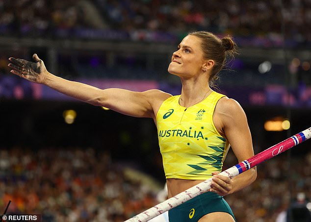 Kennedy, 27, secured gold by reaching 4.90 meters in Paris - while many fans were puzzled by the appearance of her jet-black hands during the competition.