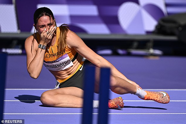The German heptathlete hit the ground in agony after picking up the issue in her warm-up