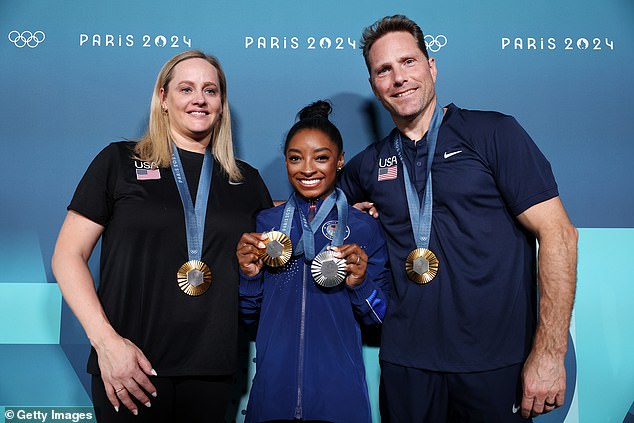 Simone Biles with coaches Cecile Landi (left) and Laurent Landi (right)
