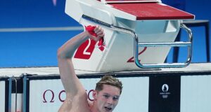 Duncan Scott wins Olympic silver in men’s 200m medley as the Team GB star becomes Scotland’s greatest-ever Olympian with eighth medal – while Leon Marchand collects fourth gold in Paris
