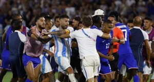 France and Argentina stars FIGHT on the pitch in 30-man brawl after hosts won Olympic quarter-final before clashes continue down the tunnel – as grudge match descends into farce amid racism storm