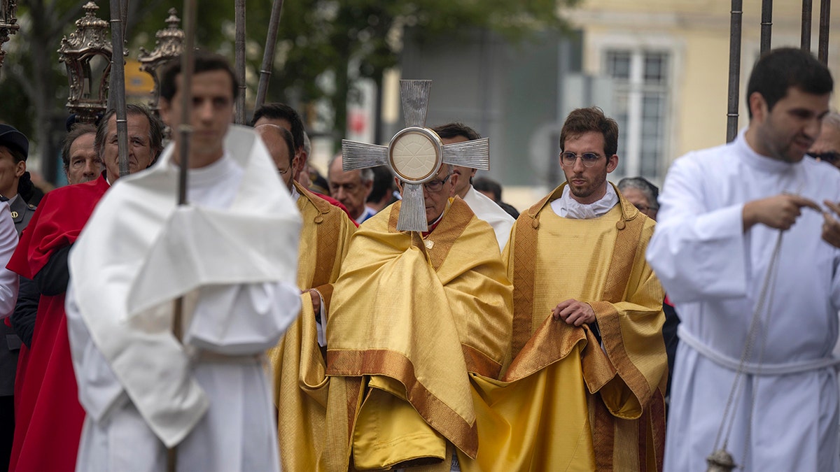 Procession featuring the Eucharist